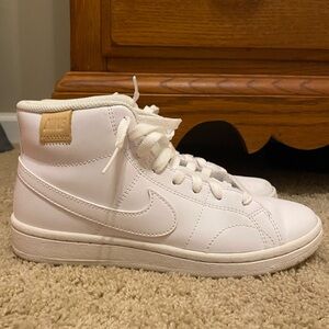 White Nike leather high tops